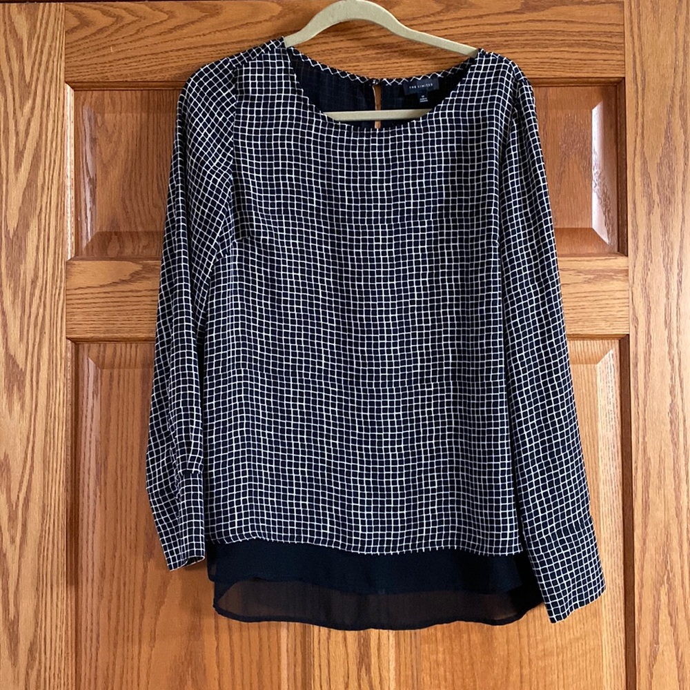 Women’s blouse, size medium.